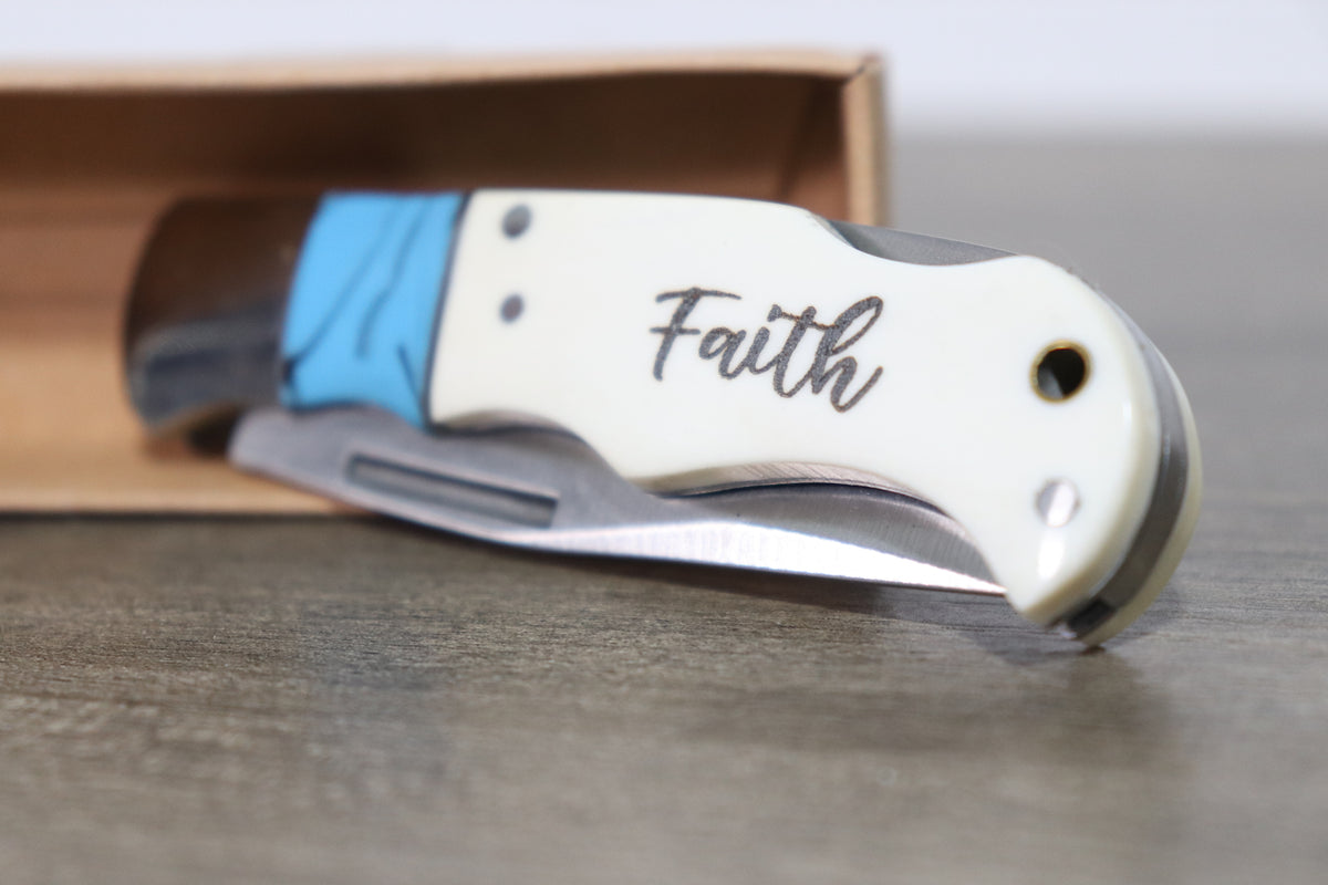 Engraved Bone Handled Knife with Teal Accent