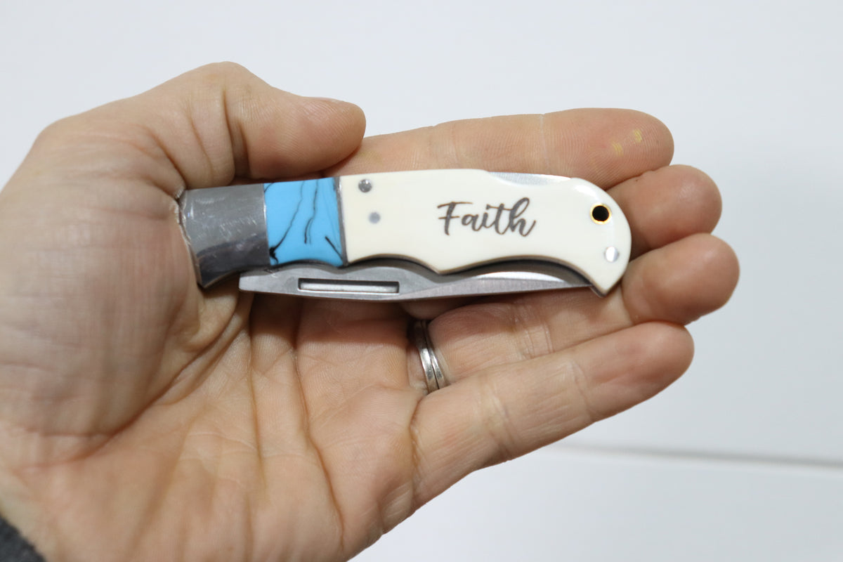Engraved Bone Handled Knife with Teal Accent